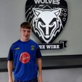 Oliver signs for Wolves Scholarship